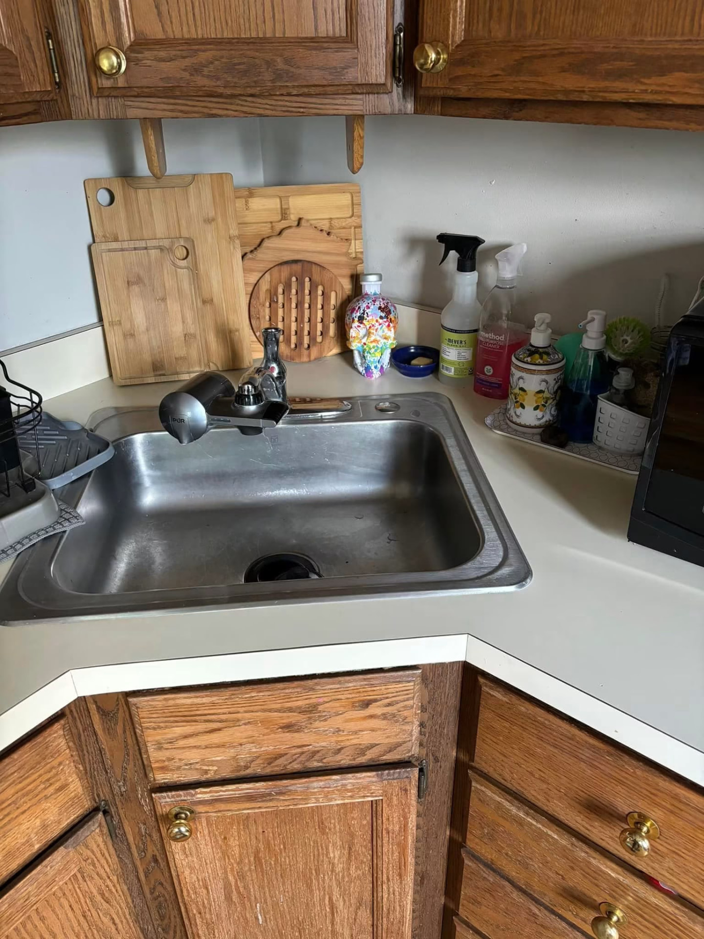 Kitchen: sink, counters & clutter cleared after Ocean Shine cleaning